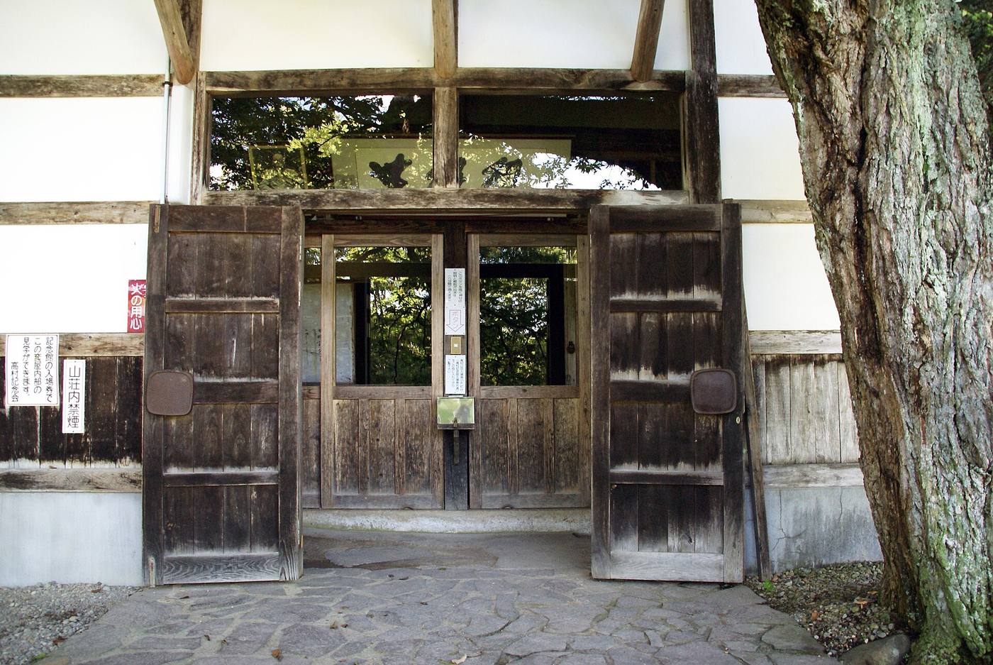 Takamura Kotaro’s small wooden cottage preserved inside its protective shelter.